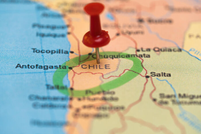 Map with a red pin marking Chile location