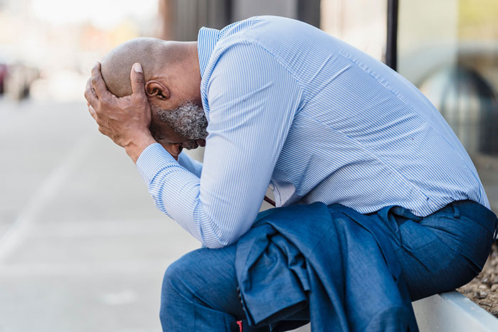 Stressed man displaying emotional red flags
