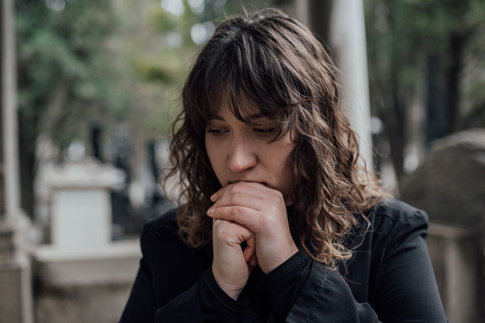 Worried woman reflecting on red flags missed before her wedding