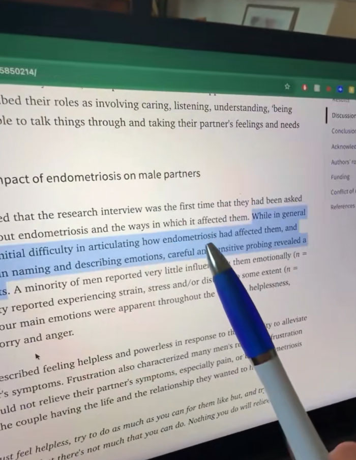 A hand holding a pen pointing at a highlighted paragraph about men's difficulty articulating endometriosis impact in studies.