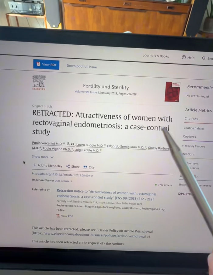 A retracted endometriosis study on a laptop screen, highlighting infuriating research practices and a doctor's disbelief.