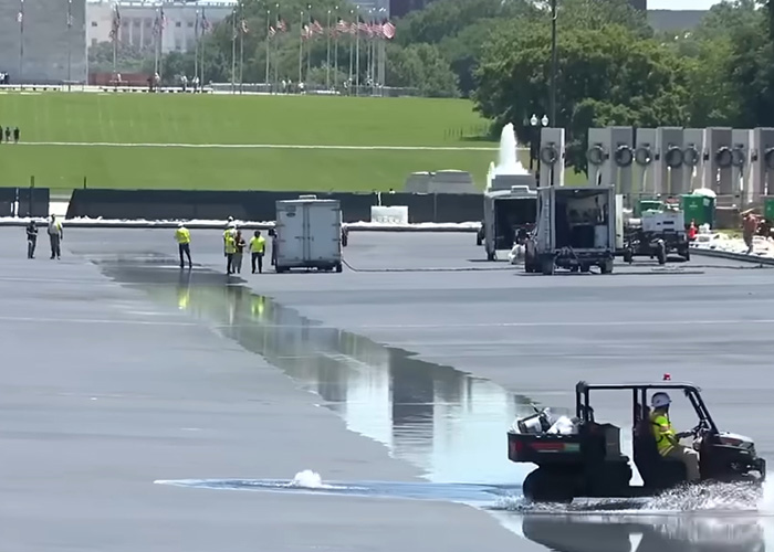 Workers cleaning the Reflecting Pool in Washington D.C. for the $14 million project Workers cleaning the Reflecting Pool in Washington D.C. for the $14 million project