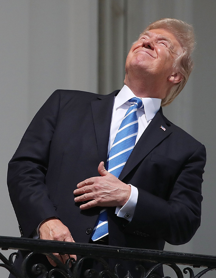 Donald Trump gaffe looking directly at the solar eclipse.