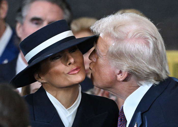 Donald Trump gaffe with Melania as he leans in for a kiss during an event.