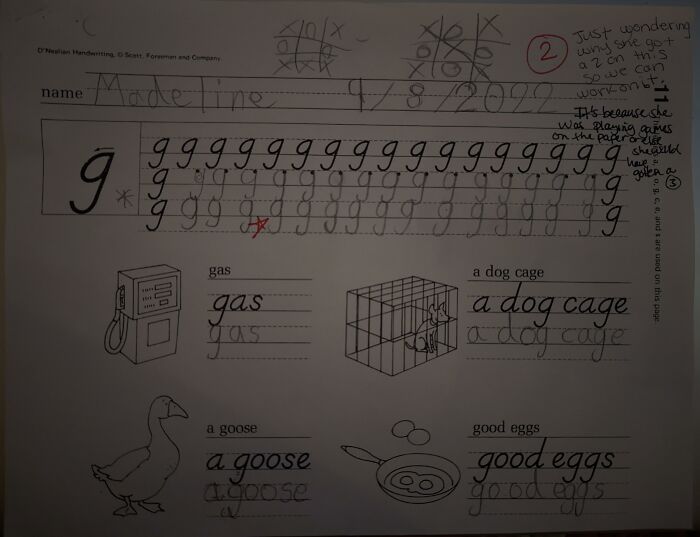 A childs handwriting worksheet with red marks and notes about a teachers grade, showing an annoying teacher.