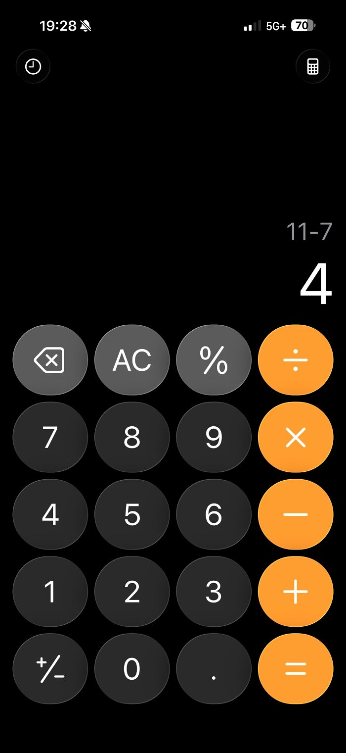 A calculator app showing 11-7=4 on a phone screen, symbolizing the worst things found on partners phone.