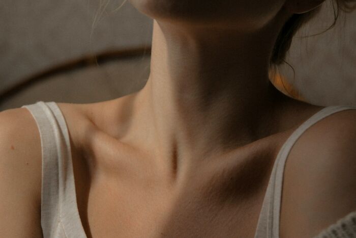 Close-up of human neck and collarbone skin texture