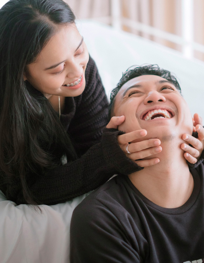 Couple smiling and enjoying close moment highlighting spoiled pig syndrome in modern dating