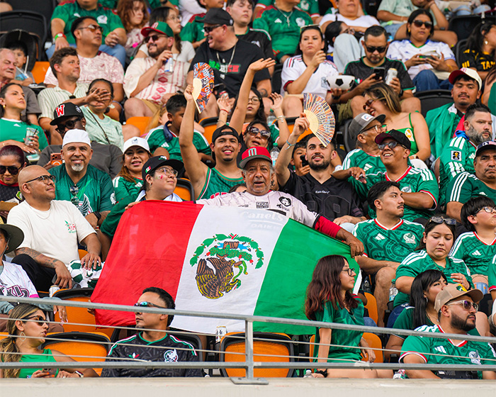 Fans at World Cup with Mexican flag, context for former mayor's controversial outfit and global uproar. Fans at World Cup with Mexican flag, context for former mayor's controversial outfit and global uproar.