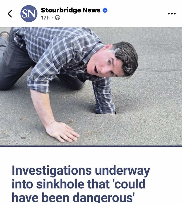 Investigation underway into dangerous sinkhole with man peering inside on road