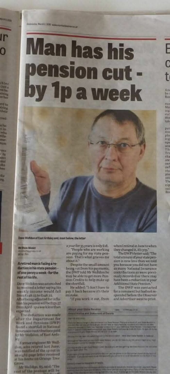 Man holding newspaper with headline about pension cut by one penny a week