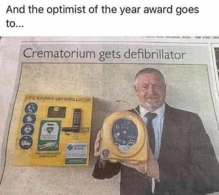 Newspaper headline about a crematorium receiving a defibrillator with a smiling man