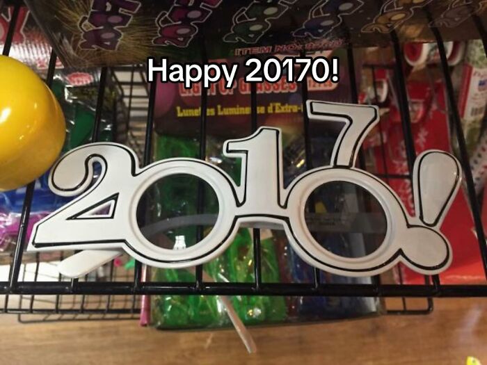 A hilariously bad design fail, novelty glasses shaped like 2017 with an exclamation mark, but appearing as 20170.