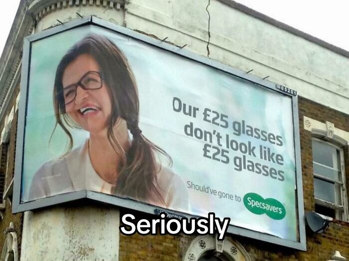 A hilariously bad design fail, an outdoor billboard advertising glasses with an unflattering image of a woman.