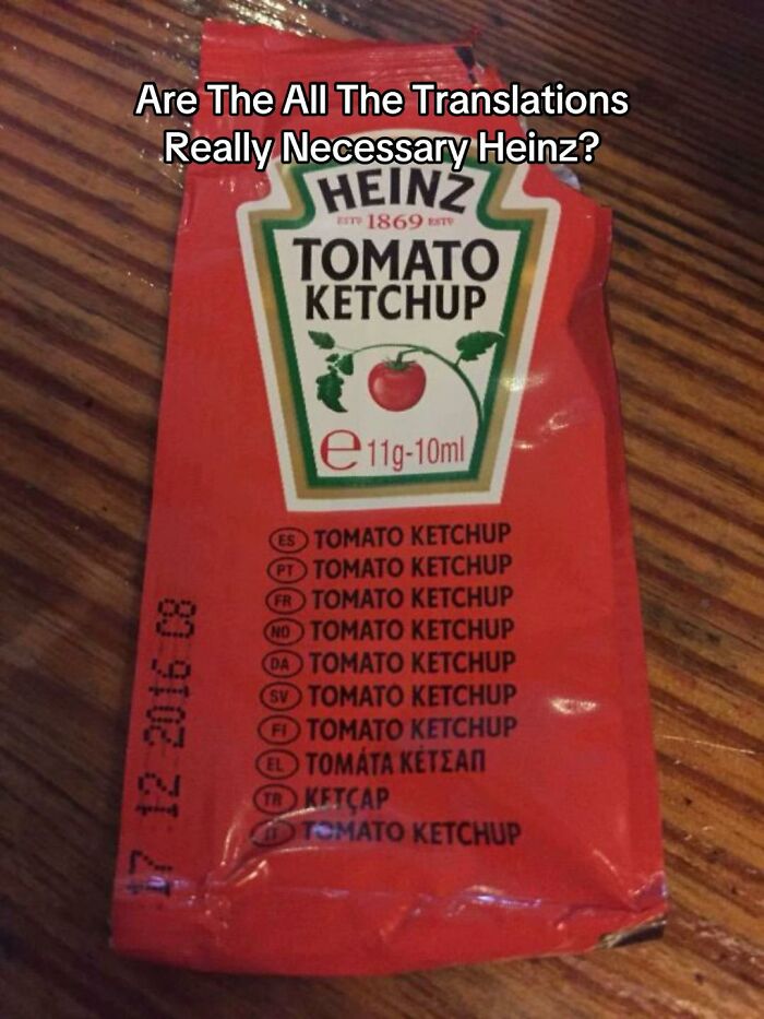 A Heinz ketchup packet with repetitive translations, highlighting a hilariously bad design fail.