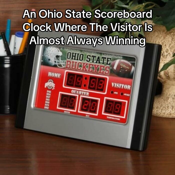 A hilariously bad design fail: an Ohio State Buckeyes scoreboard clock where the visitor team is always winning.