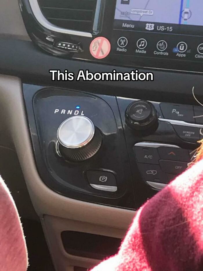 A hilariously bad design fail shows a confusing car gear shifter, featuring a rotary dial for PRNDL.