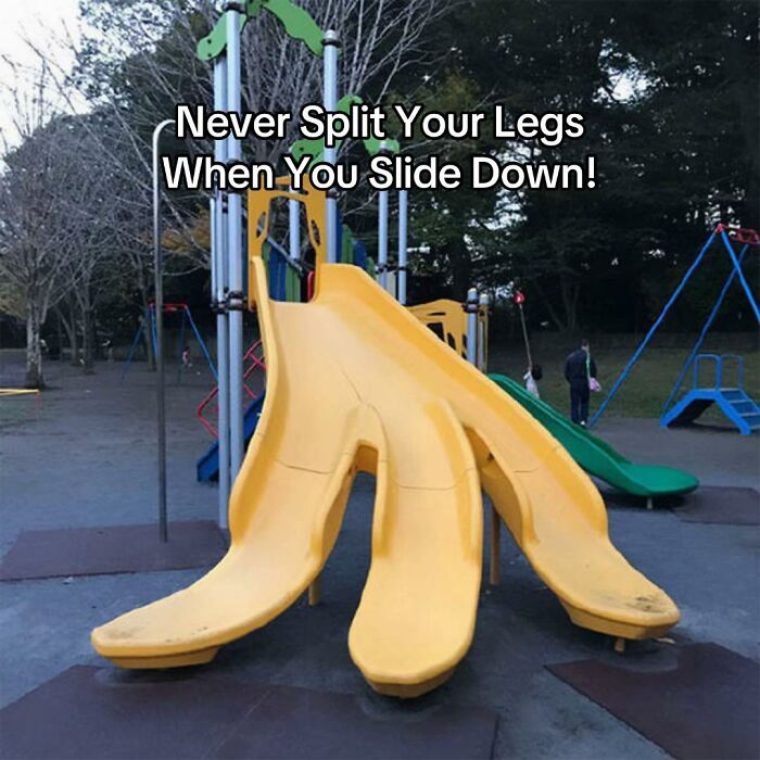 A yellow playground slide with three separate chutes, a bad design fail that could cause injury.