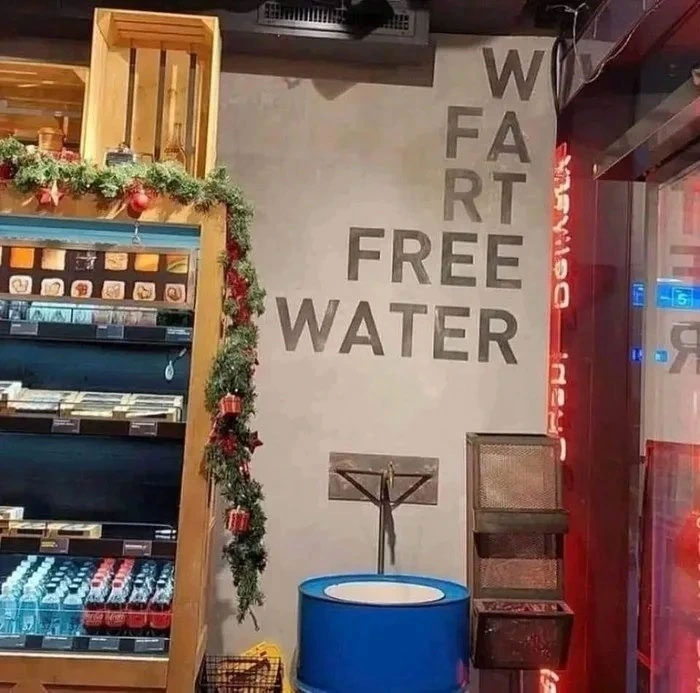 Wall text spelling water with awkward arrangement causing confusion