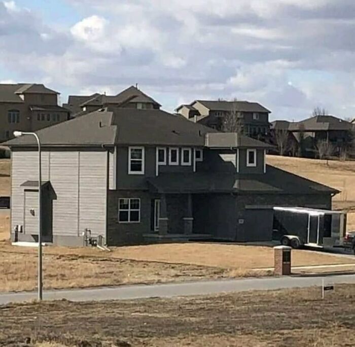 House with uneven window alignment showing a cringeworthy design fail