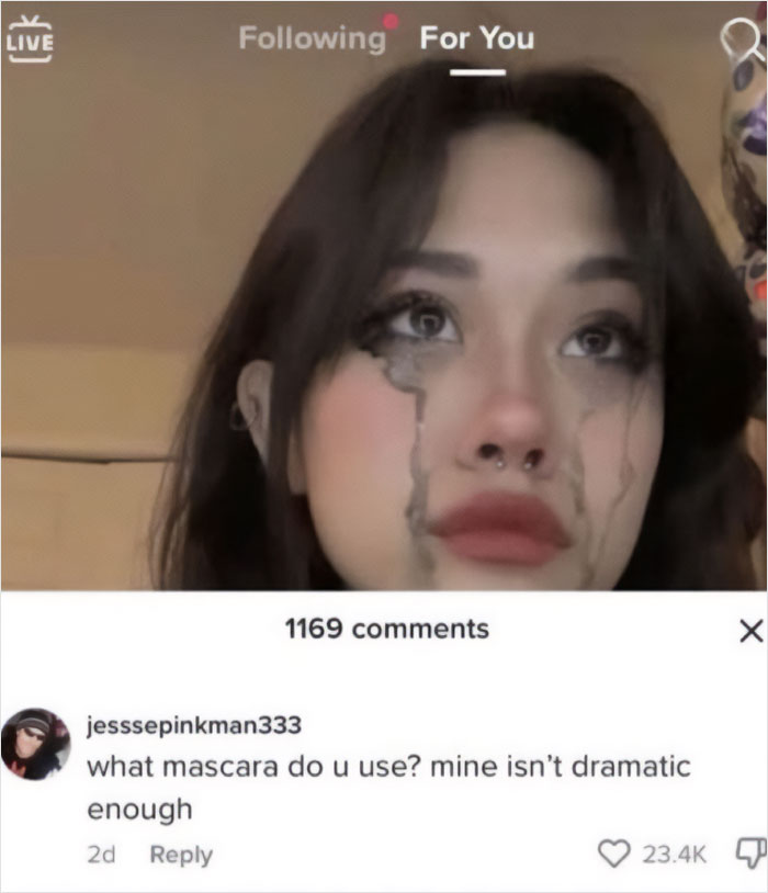 A woman with smeared mascara and tears on her face with a savage comment about her makeup.