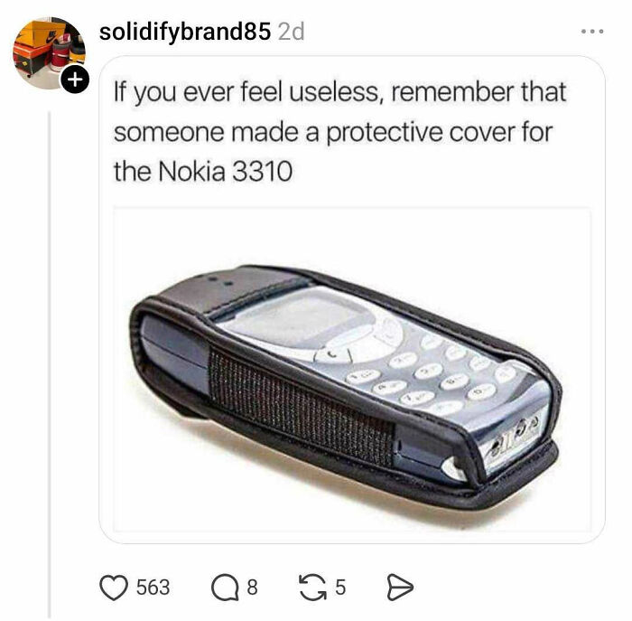 Nokia 3310 phone in a protective case with a humorous nostril caption