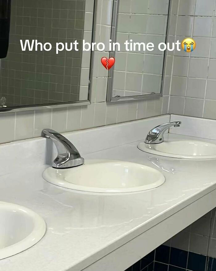 Bathroom sinks with faucets reversed and humor caption