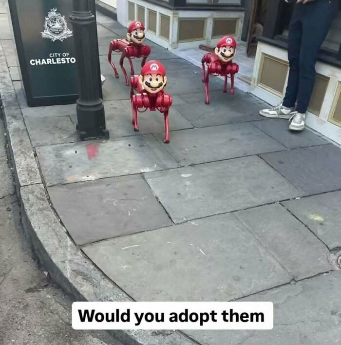 Bizarre funny screenshot of four mechanical dogs with Mario heads on a city street