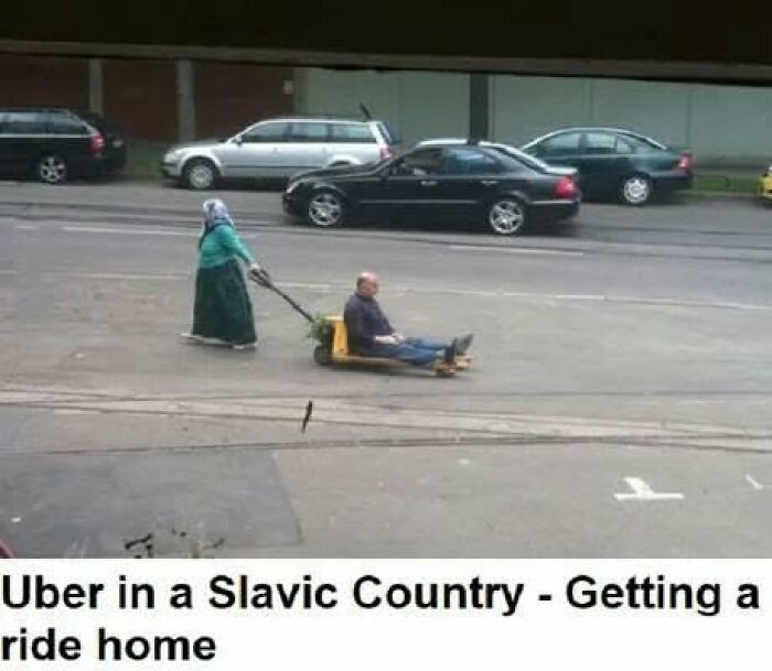 A woman pulling a man on a pallet jack, depicting an unusual form of Uber in a Slavic country, Slavic Science.