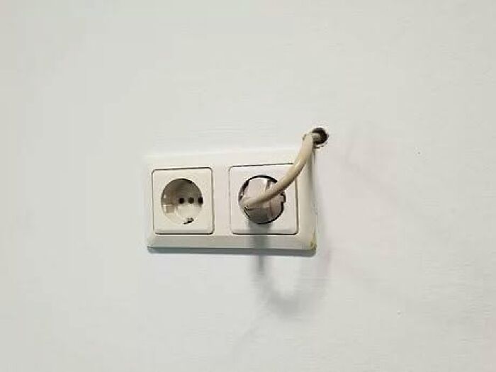 An example of Slavic science featuring a bizarrely wired electrical outlet with a cord emerging from the wall.