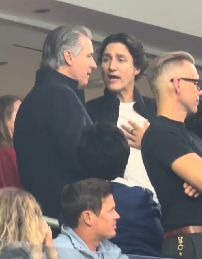 Gavin Newsom and Justin Trudeau are caught in a private moment at the World Cup in this image. Gavin Newsom and Justin Trudeau are caught in a private moment at the World Cup in this image.