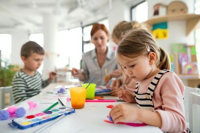 Children engaged in creative activities at a preschool classroom