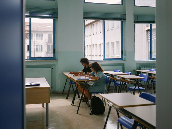 Students in a classroom, representing an awkward situation in an educational setting.