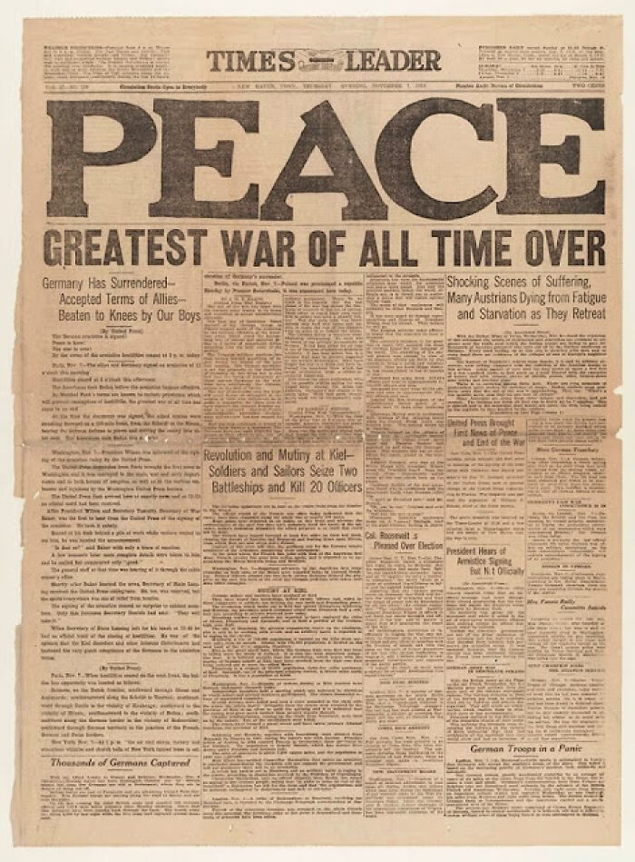 A historical newspaper headline reads Peace, Greatest War Of All Time Over, a pivotal front page story.
