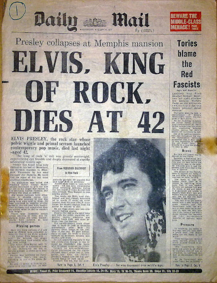 Historical newspaper headline: Elvis, King of Rock, Dies at 42. Details Presley's collapse and d***h.
