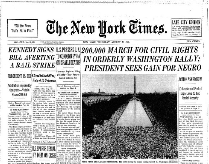 A historical newspaper headline announces a march for civil rights and its impact on the world.