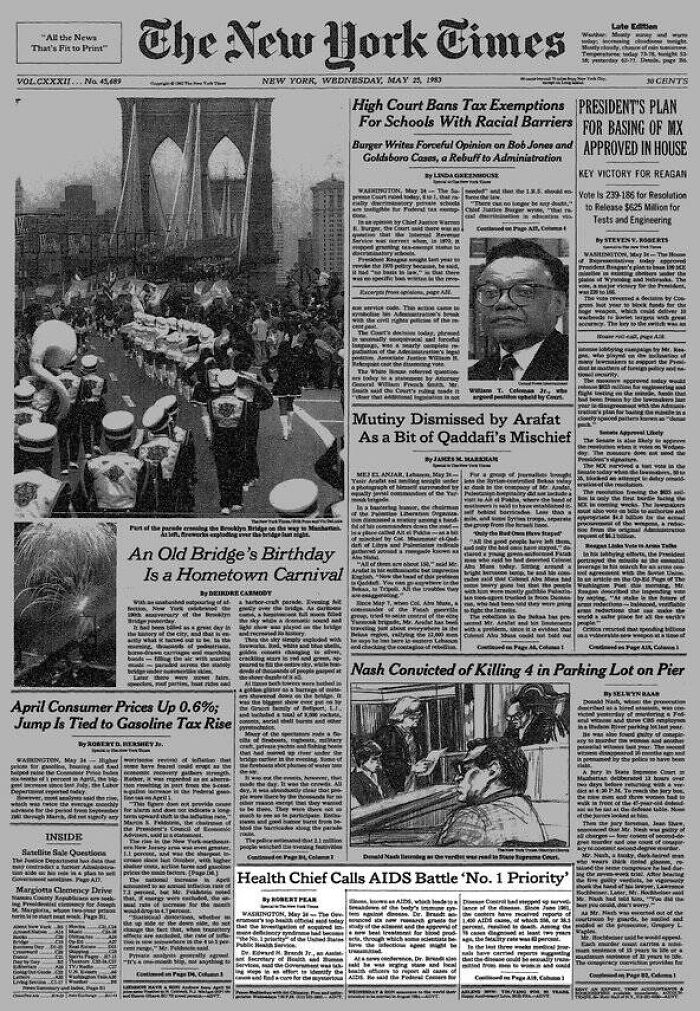 Historical newspaper headline from 1983, The New York Times, reporting Men Walk on Moon.