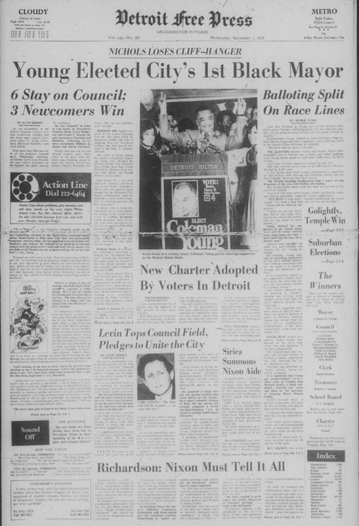 A historical newspaper headline and photo of Coleman Young, Detroit's first Black mayor, celebrating his election victory.