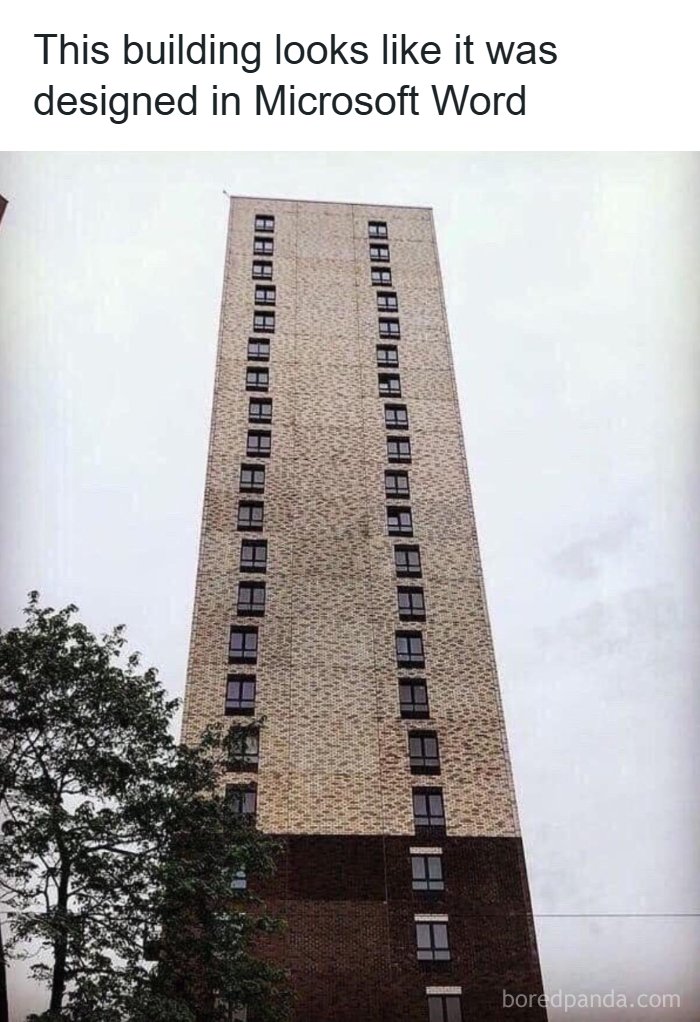 A tall, narrow building with poorly aligned windows showcasing architecture fails and design fails.