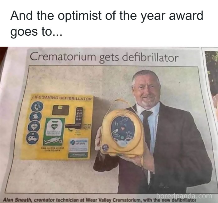 Newspaper headline about a crematorium receiving a defibrillator with a smiling man
