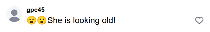 A social media comment reading 😮😮 She is looking old! about Madonna's wardrobe malfunction at Paris Fashion Week.