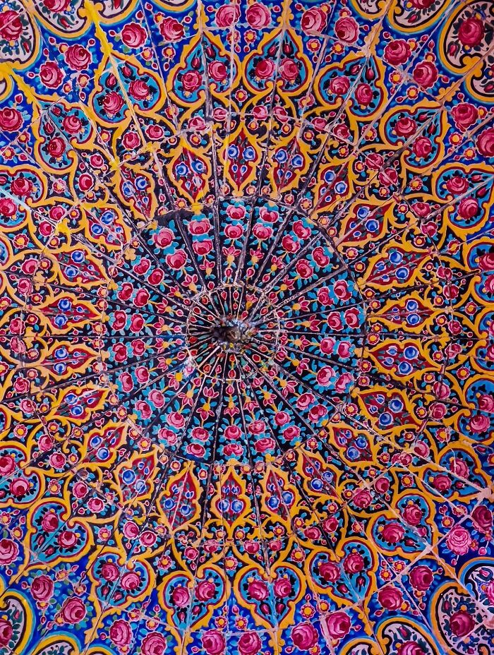 Colorful Persian floral ceiling medallion with red and yellow designs