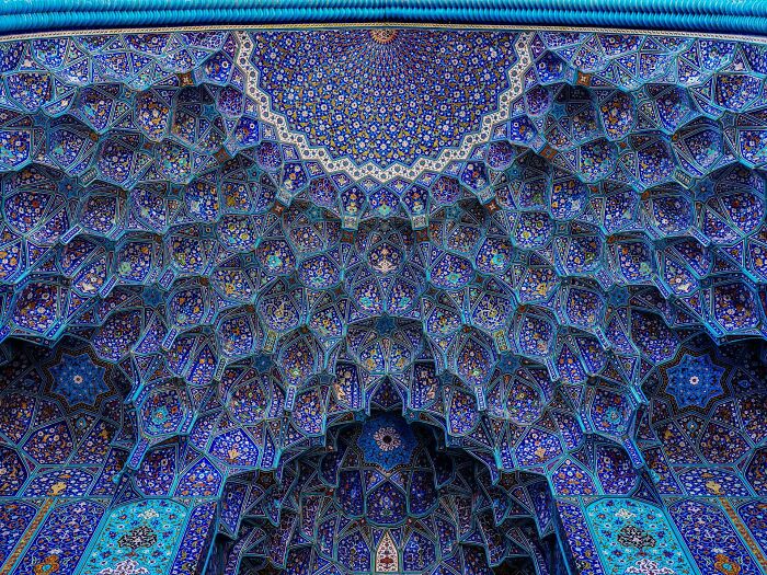 Detailed Persian geometric dome featuring blue and turquoise patterns