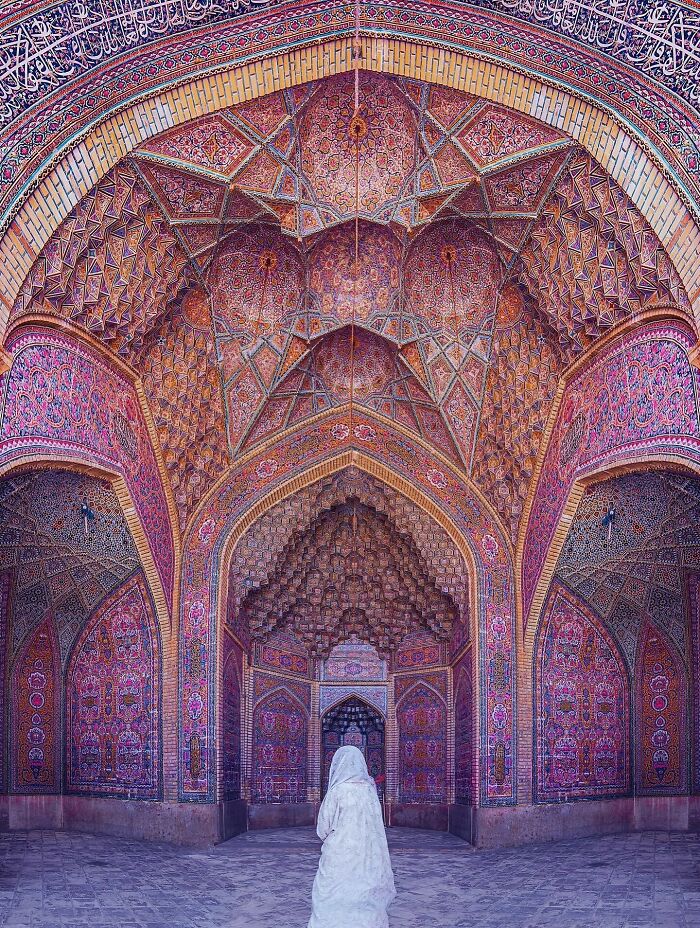 Intricate classical Persian patterns and geometry on mosque interior ceiling and walls