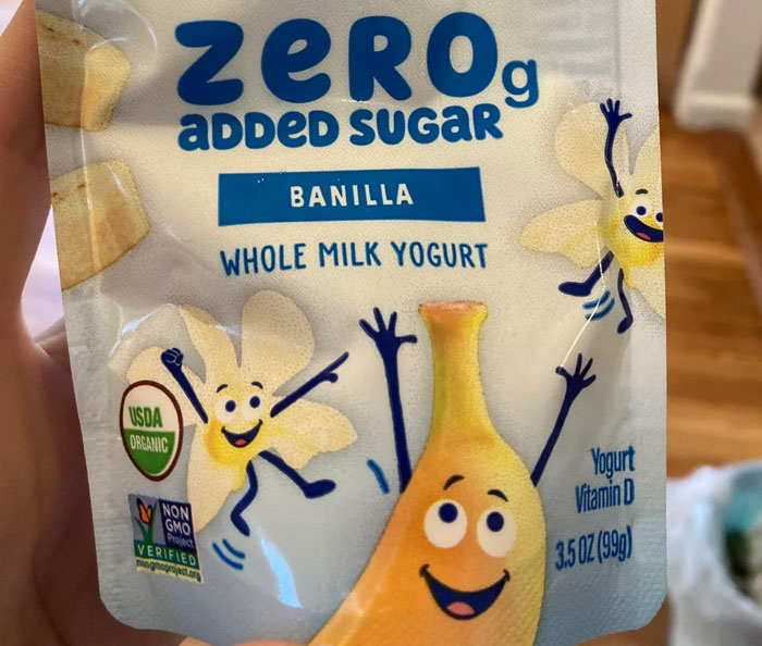 A hand holds a yogurt pouch with 'zero added sugar' and cartoon characters, hiding industry secrets customers were never meant to hear.