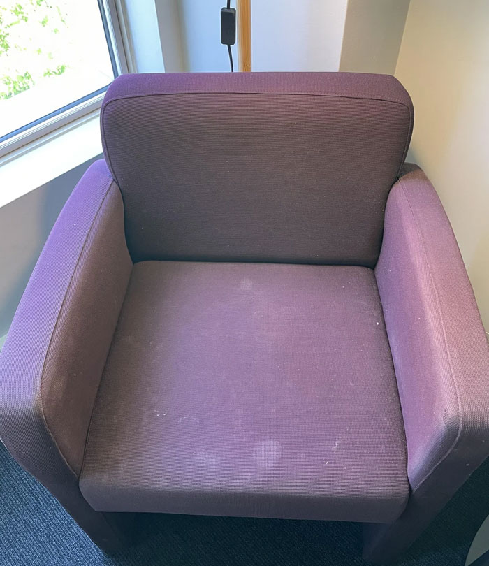 A stained, old purple armchair, suggesting a need to know industry secrets about cleanliness and travel.