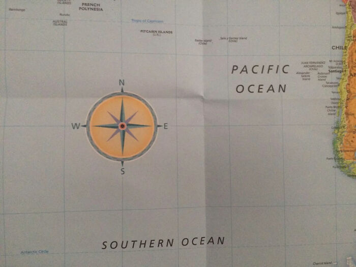 Compass rose on map showing Southern and Pacific Ocean
