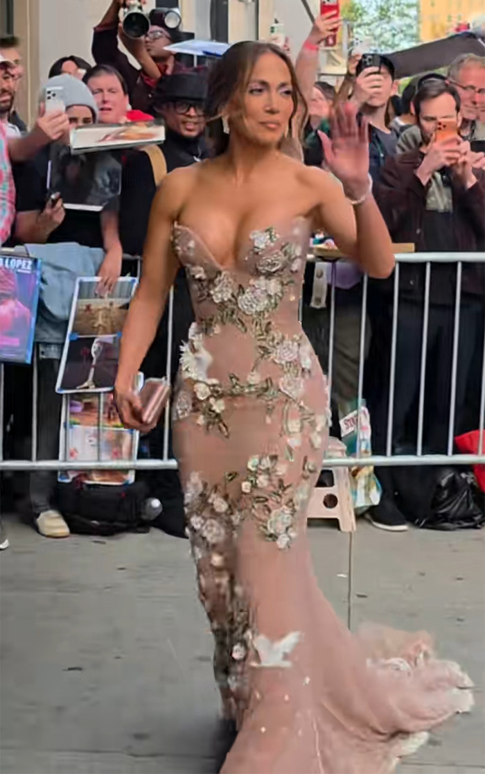Jennifer Lopez waving to fans in floral sheer gown at premiere Jennifer Lopez waving to fans in floral sheer gown at premiere