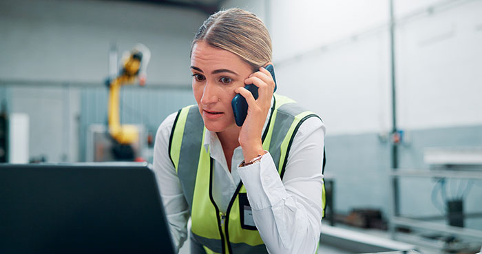 Call center worker handling frustrated customer complaint about canceled flight Call center worker handling frustrated customer complaint about canceled flight