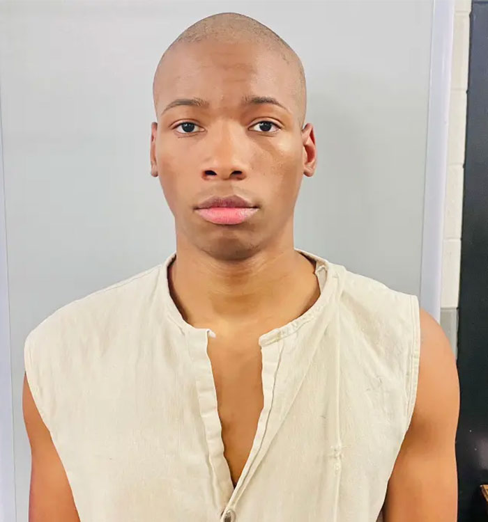 Mugshot of Karmelo Anthony in beige shirt